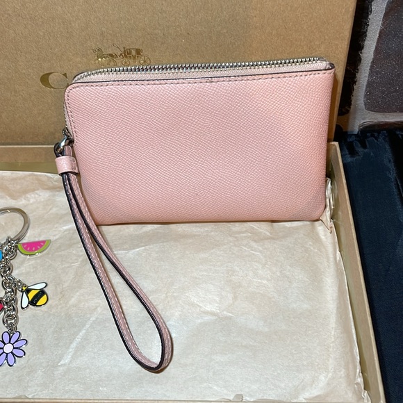 Like New Coach blush wristlet & box keychain not included - Picture 6 of 7